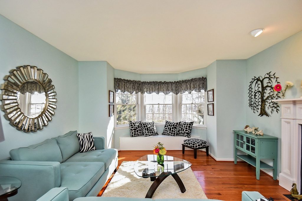 Cozy living room with teal furniture.