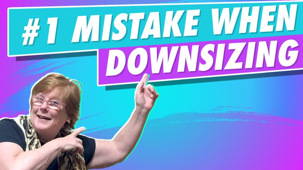 Woman pointing at downsizing mistake text.
